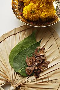 PictureIndia - betel nut and leaves with chrysanthemums top view