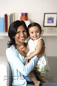 PictureIndia - woman with baby, both smiling