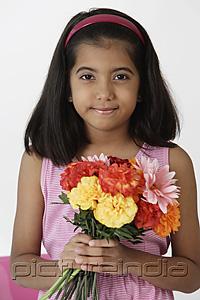 PictureIndia - Girl holding bouquet of flowers