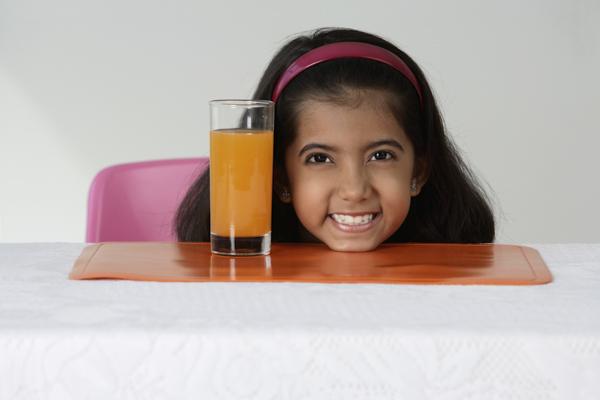 PictureIndia - Girl with glass of juice