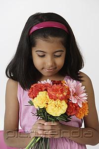 PictureIndia - Girl holding bouquet of flowers