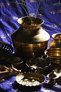 PictureIndia - Still life of Indian bronze bowls and plates