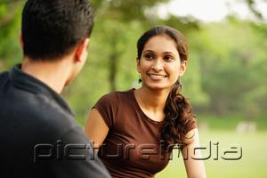PictureIndia - Woman facing man, smiling