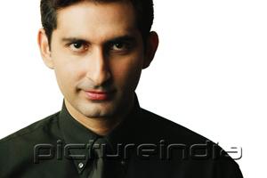 PictureIndia - Man looking at camera