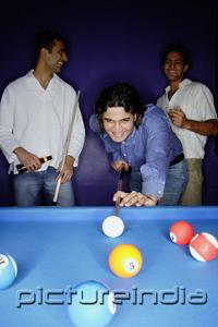 PictureIndia - Young men playing pool