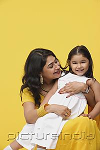 PictureIndia - Woman embracing daughter
